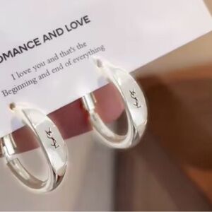 Elegant Designer brand Silver Hoop Earrings